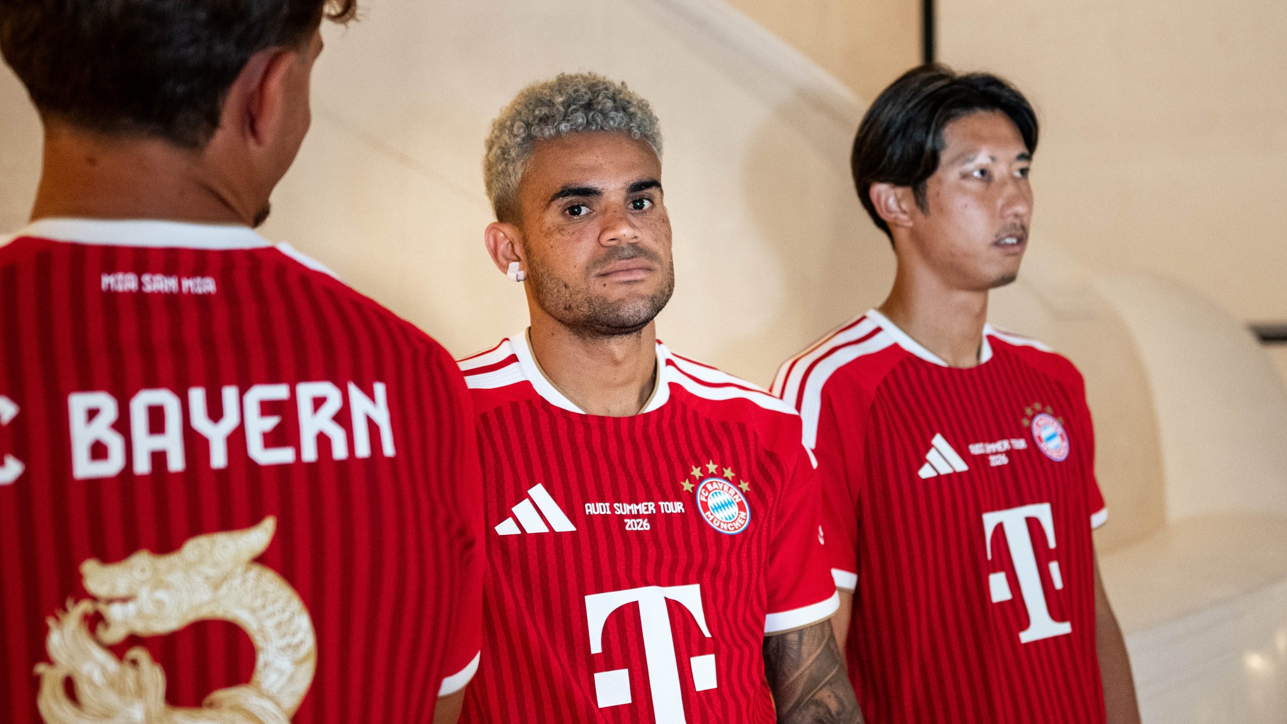Díaz, Bischof and Ito in the red home jersey