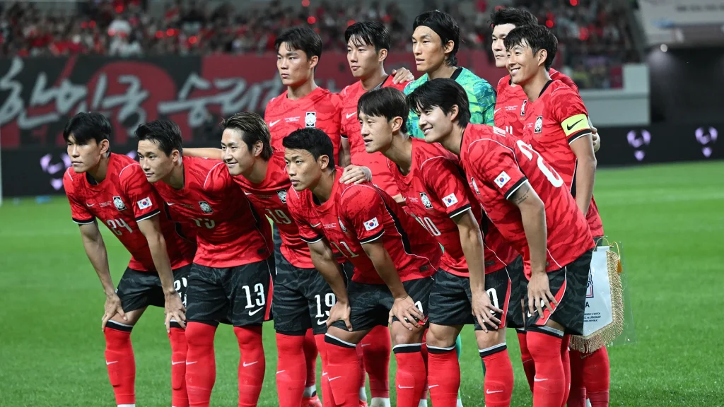The South Korean players line up for a photo before kick-off